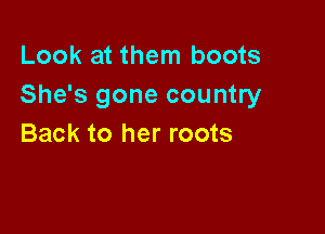 Look at them boots
She's gone country

Back to her roots