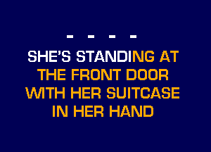 SHE'S STANDING AT
THE FRONT DOOR
WTH HER SUITCASE
IN HER HAND
